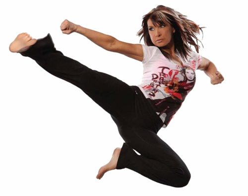 Cynthia Rothrock executing a flying kick