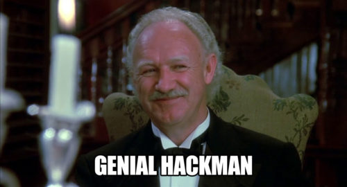 A screenshot of Gene Hackman smiling with the caption "Genial Hackman"