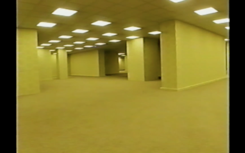 A video shot of an empty yellow room with multiple exits, also known as the creepypasta staple the Backrooms