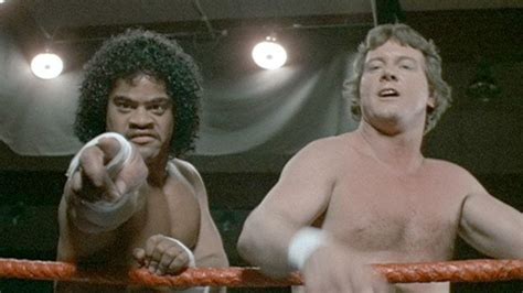 Sam Fatu and Roddy Piper in Body Slam (1986)