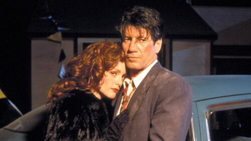 A disheveled Julianne Moore and Fred Ward from the climax of CAST A DEADLY SPELL (1991)